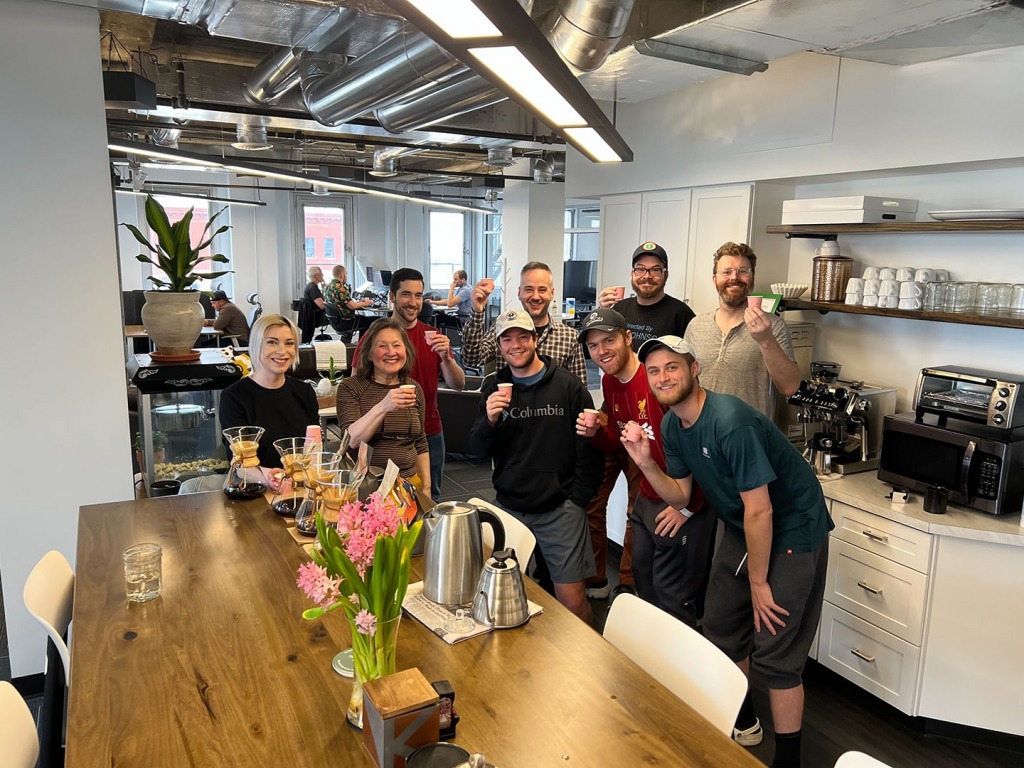 A group of Factory members enjoying coffee samples from Sparrows Coffee.