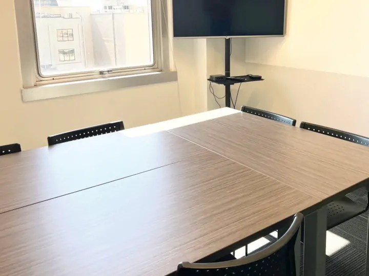 Three tables in the Eastown conference room