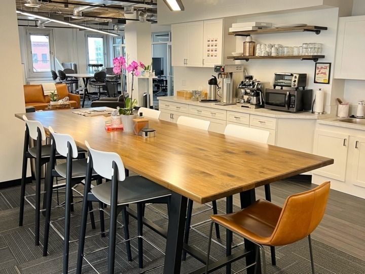 The large kitchen table for games, conversations, and eating