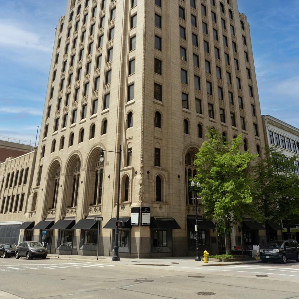 Photo of the 77 Monroe Building at street level
